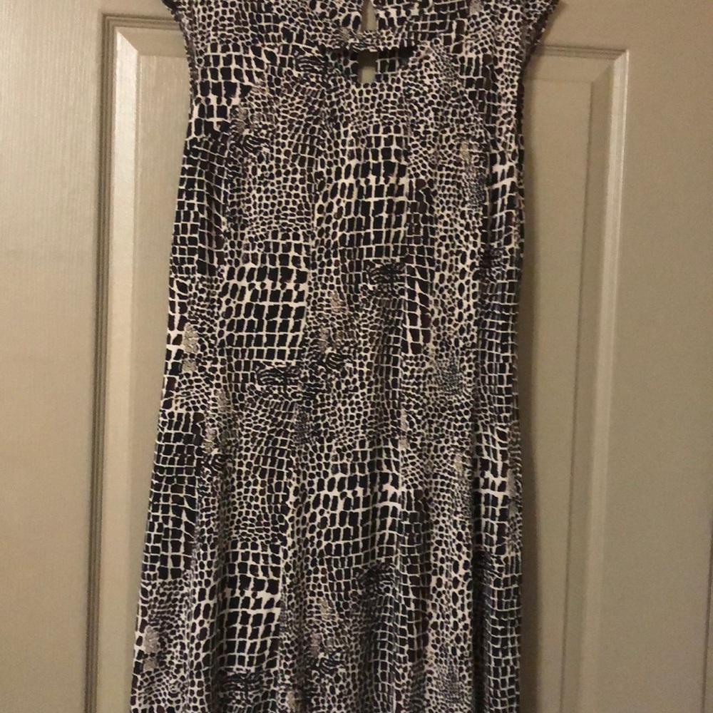 Gabby Skye beige and brown sleeveless dress.